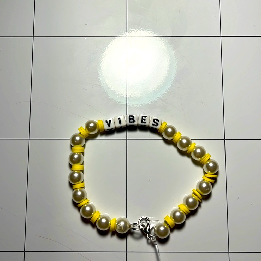 Yellow pearl anklet that says vibes!